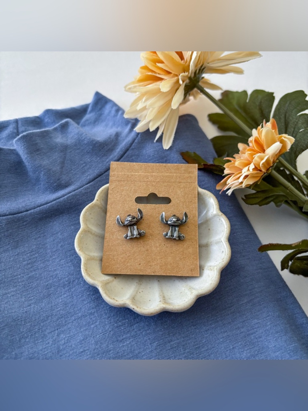 Disney Stitch earrings.